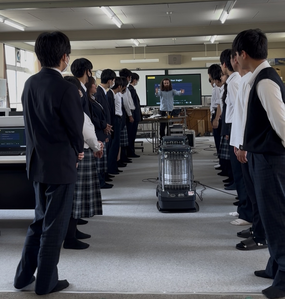Dr Simon Goorney leading a physics workshop with school students in Japan